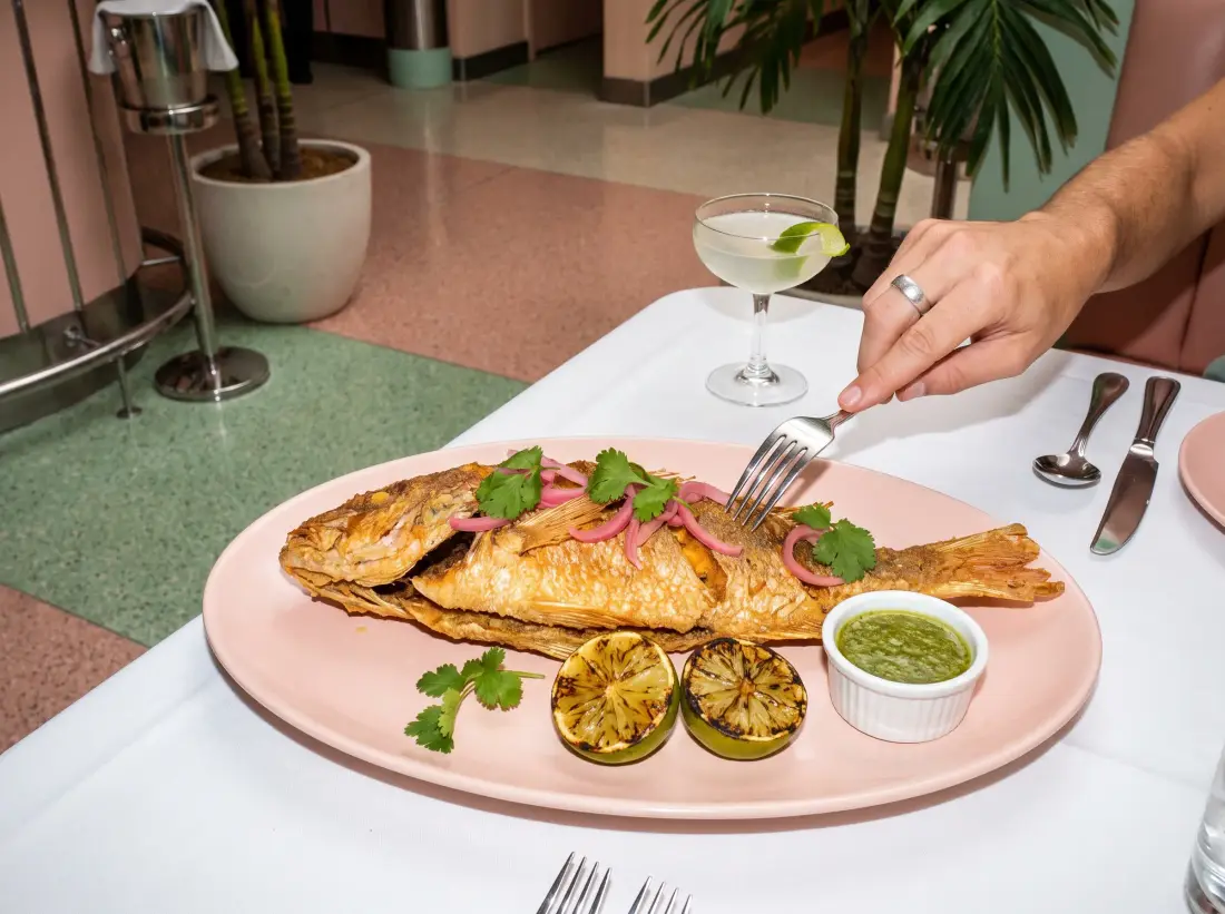 Whole fried yellowtail snapper with charred lime and mojo verde